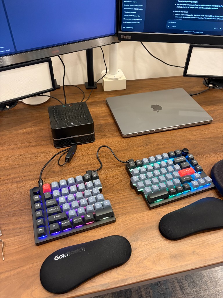 Keychron Q11 split mechanical keyboard with RGB backlighting and Goldtouch wrist rests